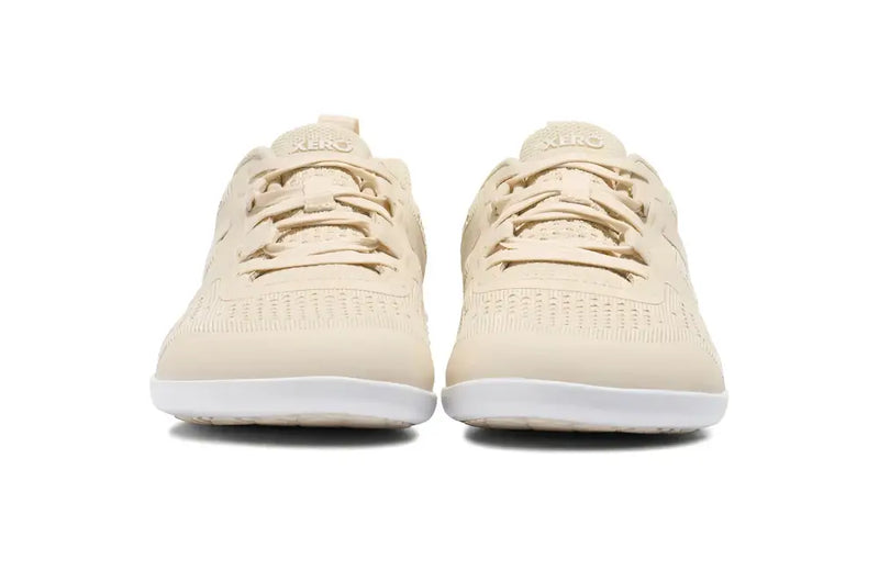 Pair of light beige Xero Shoes with white soles, front view