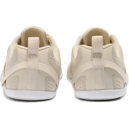 Rear view of two beige athletic shoes with white soles